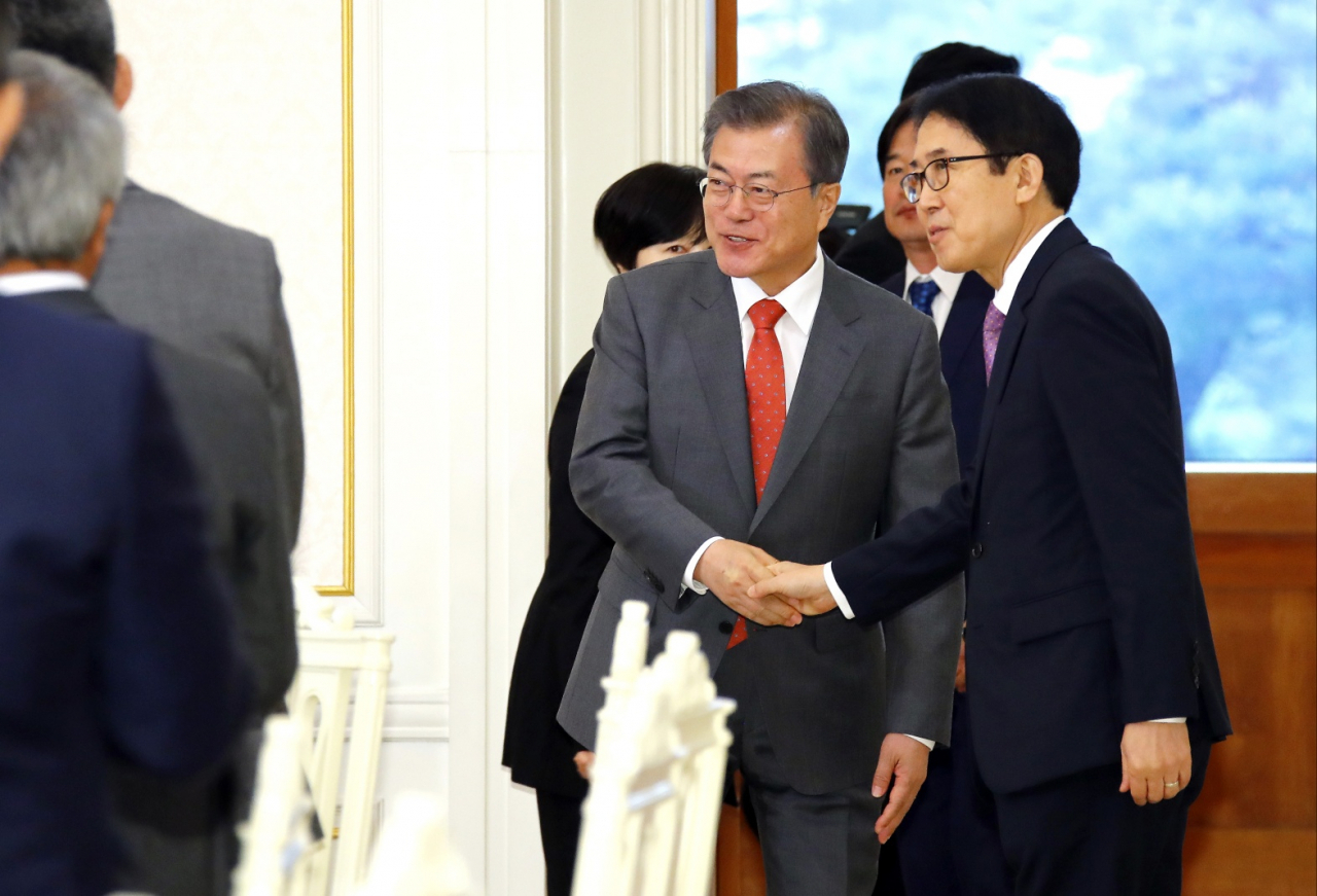 Editors from the Asia News Network meets with then-President Moon Jae-in on the sidelines of the 2019 ANN board meeting hosted by The Korea Herald in Seoul.