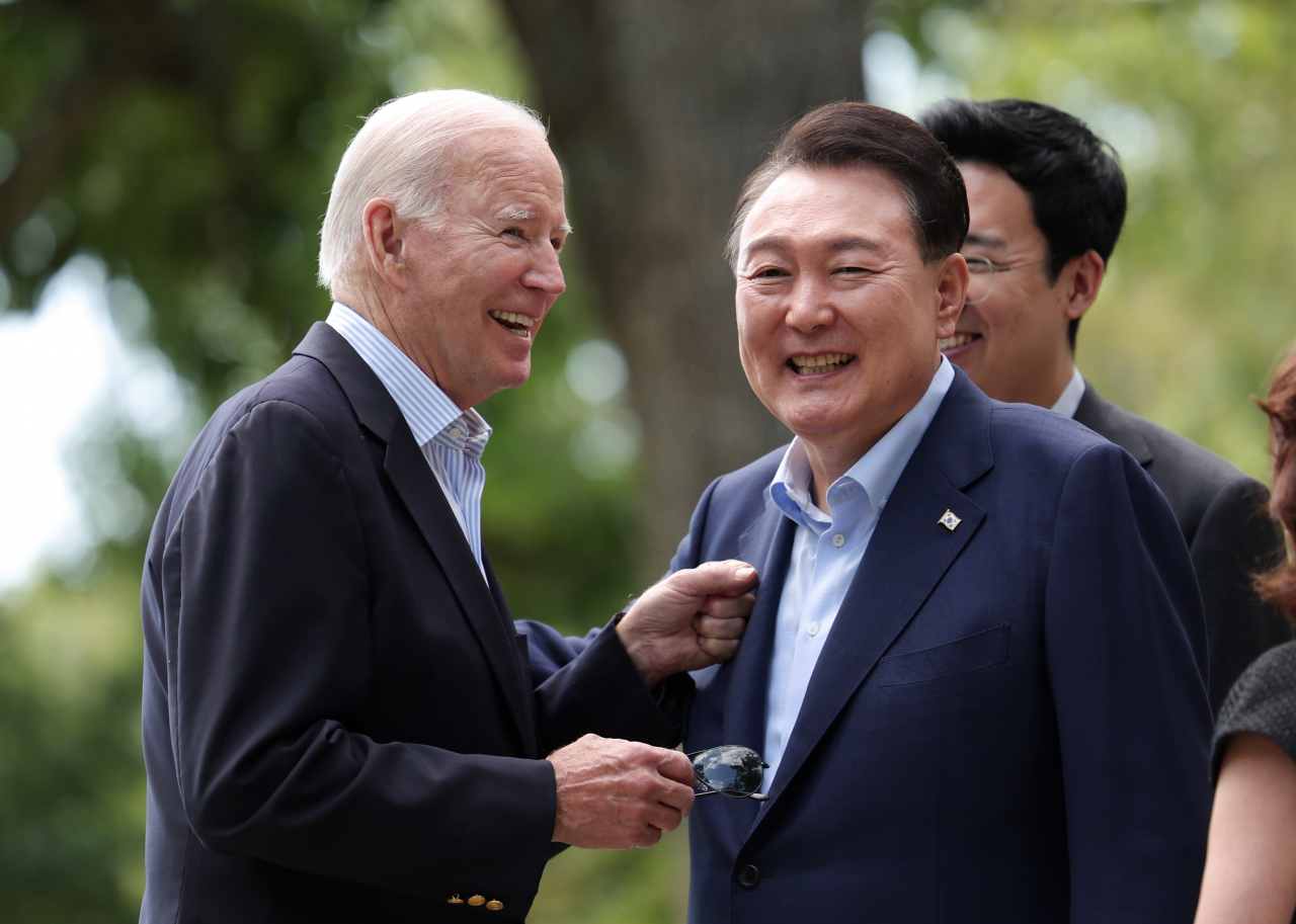 President Suk Yeol Yoon and US President Joe Biden talk at Camp David near Washington, DC on Friday (local time).