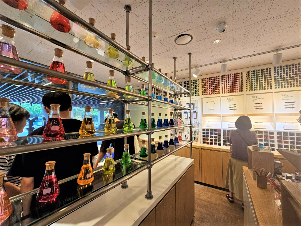 Visitors look through different kinds of stationery items at the Monami concept store in Insa-dong, northern Seoul. (Kim Hae-yeon/ The Korea Herald)