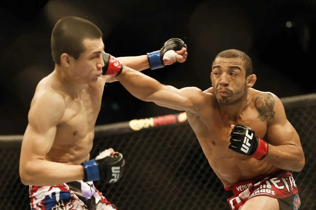 Then-UFC featherweight champion Jose Aldo and Jung Chan-sung battle during their featherweight championship bout in Rio de Janeiro, Brazil, Aug. 4, 2013. (AP)