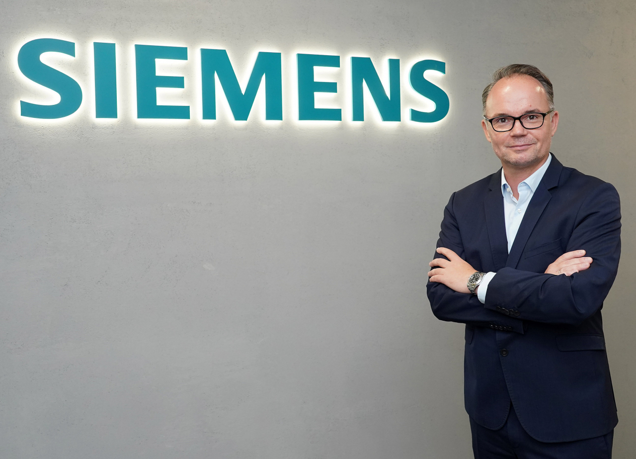 Tino Hildebrand, vice president and head of digital industries at Siemens Korea, poses for a photo during a recent interview with The Korea Herald at the company's Seoul office. (Siemens Korea)