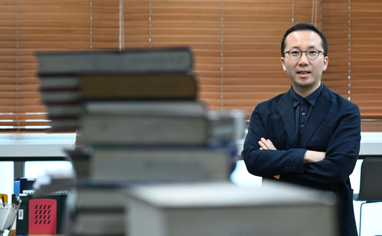 Kang Bum-joon, associate professor in the architecture and architectural engineering department at Seoul National University, in his office on June 21 (Lee Sang-sub/The Korea Herald)