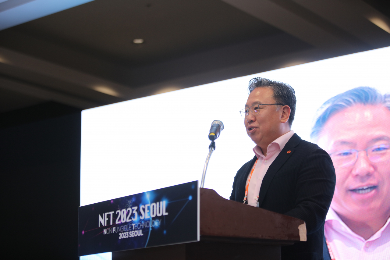 Patrick Yoon, from cryptocurrency exchange company Crypto.com Korea, gives a talk at the NFT 2023 Seoul Conference at Coex in southern Seoul, Friday. (ArtToken)