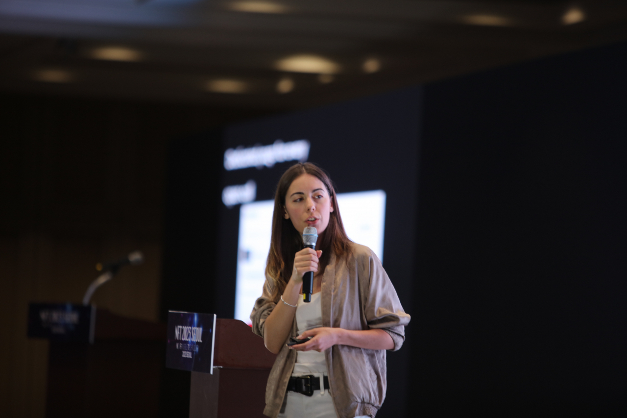 Aleksandra Artamonovskaja, lead partner of Joyn.xyz, a collaborative platform for Web 3.0 media, speaks during the NFT 2023 Seoul Conference held at Coex in southern Seoul, Friday. (ArtToken)