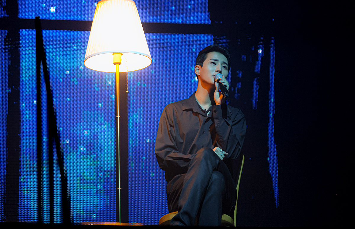 Young K performing on the last day of his first solo concert 'Letters with notes' held in Seoul on Sunday. (JYP Entertainment)