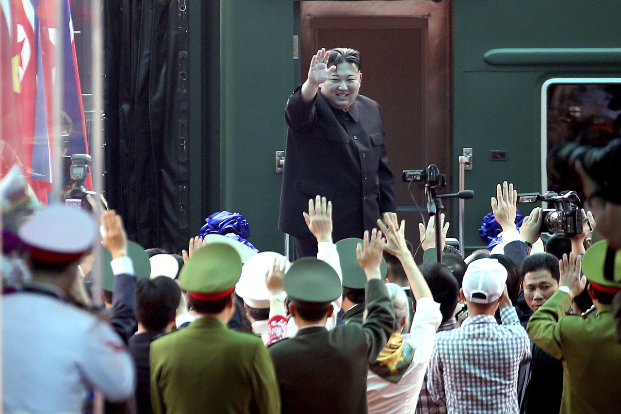 North Korean leader Kim Jong-un waves at the Dong Dang railway station in Dong Dang, Vietnam, on March 2, 2019. (AP)