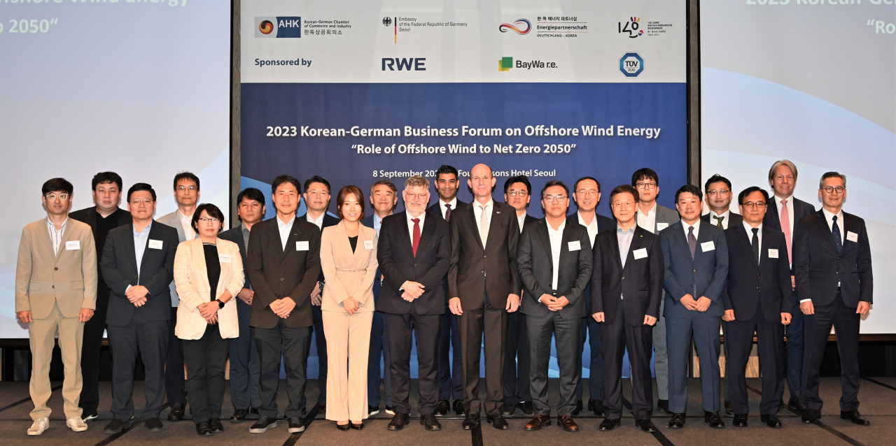 Attendees pose for a group photo at the second Korean-German Business Forum on Offshore Wind Energy at the Four Seasons Hotel in Seoul on Friday. (KGCCI)
