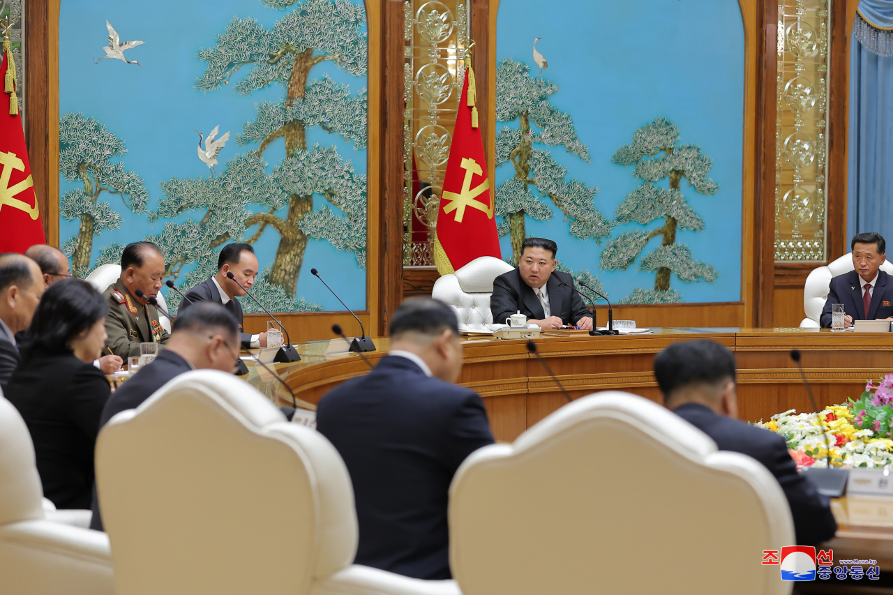 North Korean leader Kim Jong-un (center, rear) presides over a Politburo session of the Workers' Party of Korea in Pyongyang on Wednesday to discuss the outcome of his latest summit meeting with Russian President Vladimir Putin, in this photo released by the North's official Korean Central News Agency on Friday. (Yonhap)
