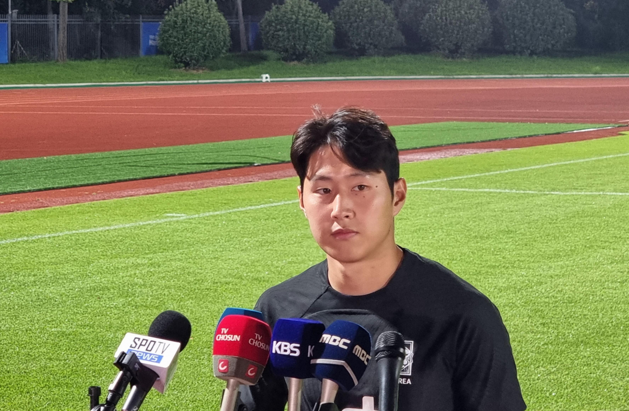 Lee Kang-in, midfielder on the South Korean men's Asian Games football team, speaks to reporters before a training session at the training field in Jinhua Sports Centre Stadium in Jinhua, China (Yonhap)