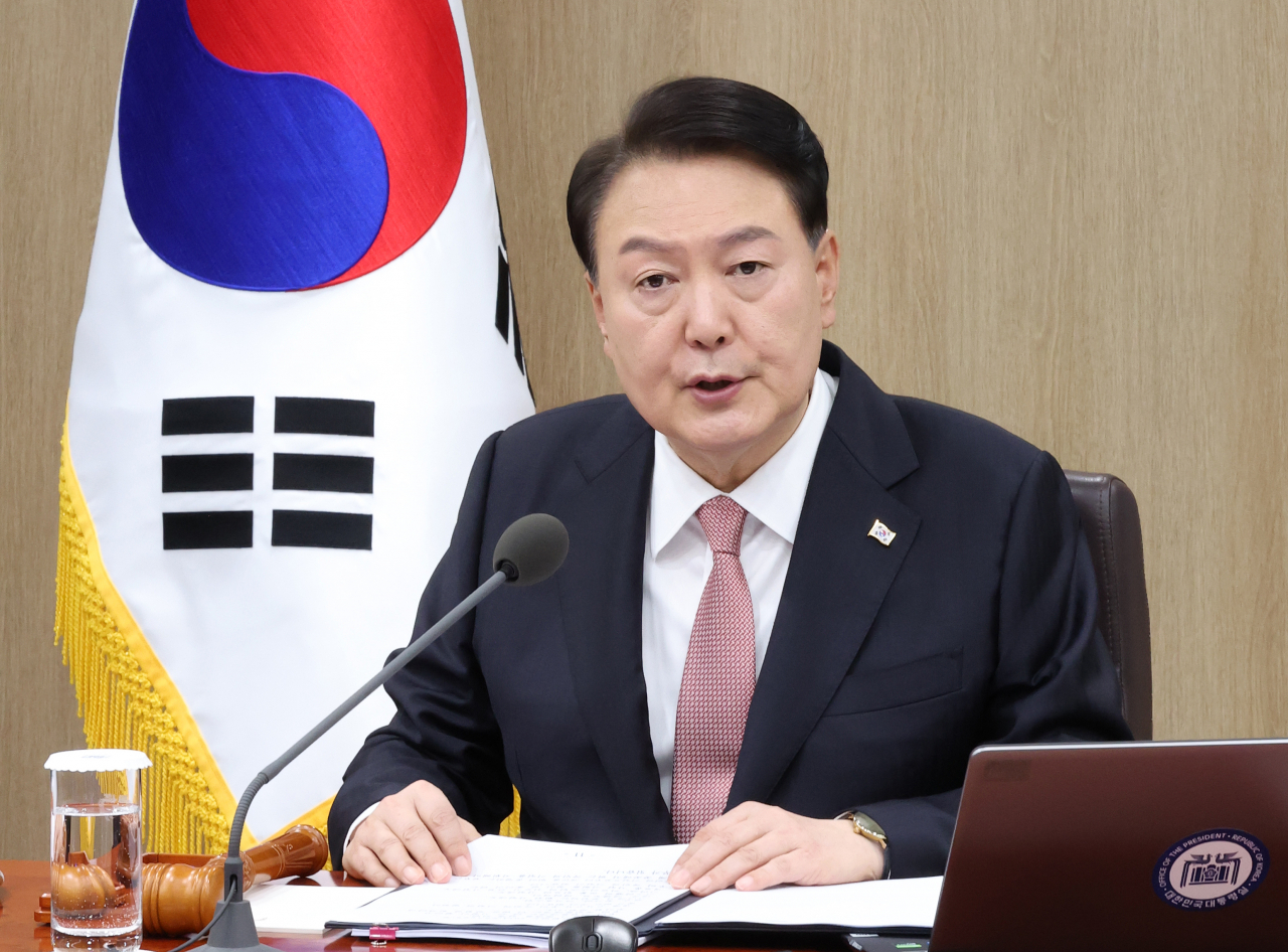 President Yoon Suk Yeol presides over a Cabinet meeting in his office in Seoul on Monday. (Yonhap)