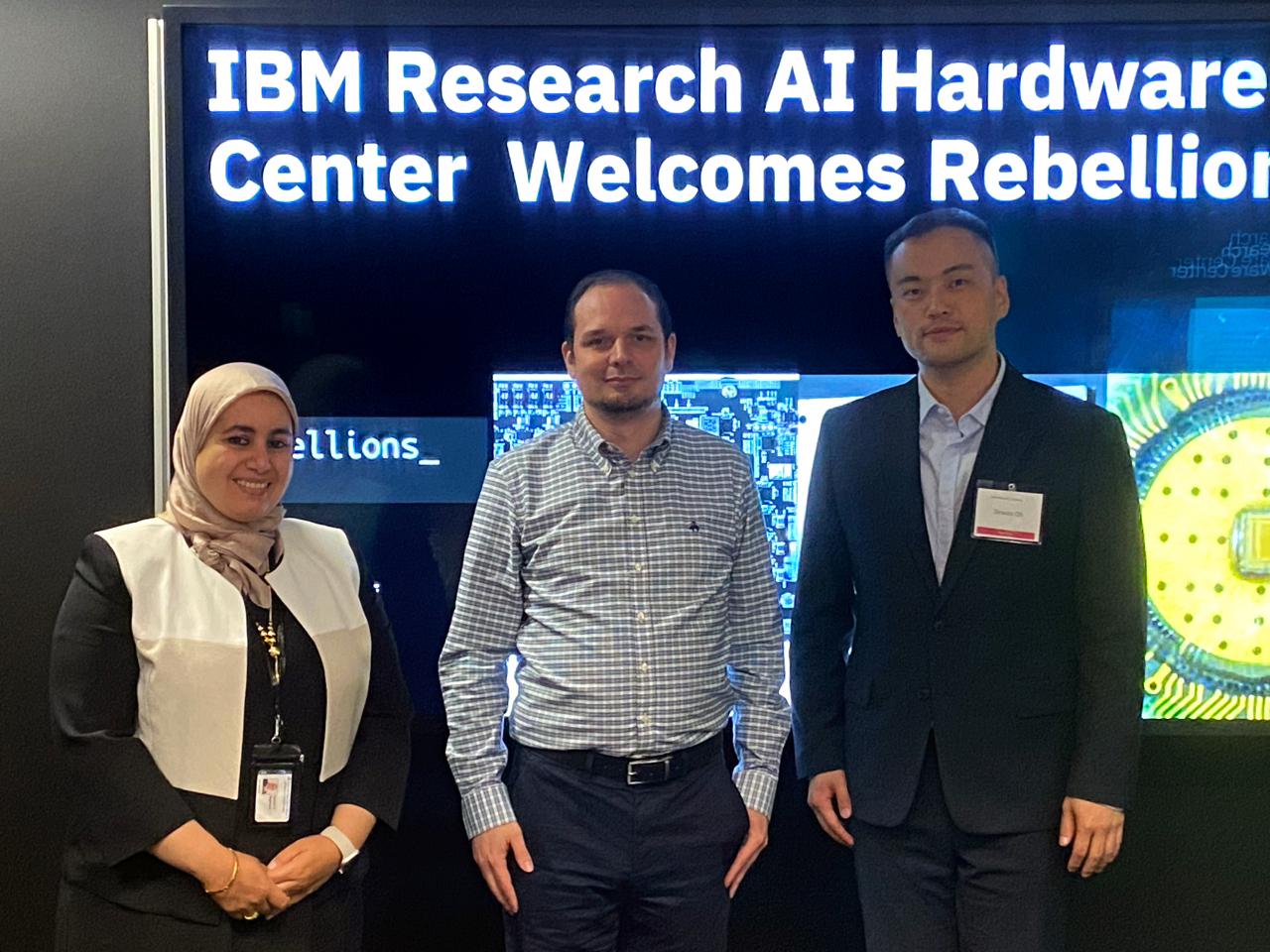 From left: Kaoutar El Maghraoui, a principal research scientist at IBM Research AI, John Rozen, a program director at AI Hardware Center, and Oh Jin-wook, chief technology officer and co-founder of Rebellions, pose for a photo at IBM Research's AI Hardware Center in Albany, New York. (Rebellions)