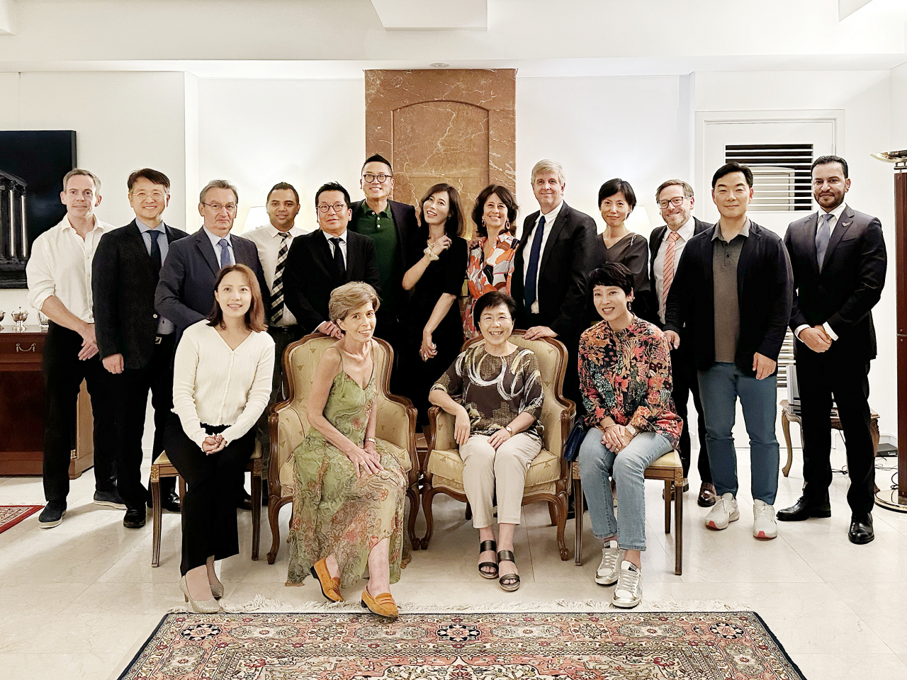 Greek Ambassador to Korea Ekaterini Loupas (second from left, first row) and Choi Jung-hwa, president of the Corea Image Communication Institute (CICI) (second from right, first row) pose for a group photo with attendees at an event focusing on cultural diplomacy at her residence in Seongbuk-gu, Seoul, on Tuesday. (CICI)
