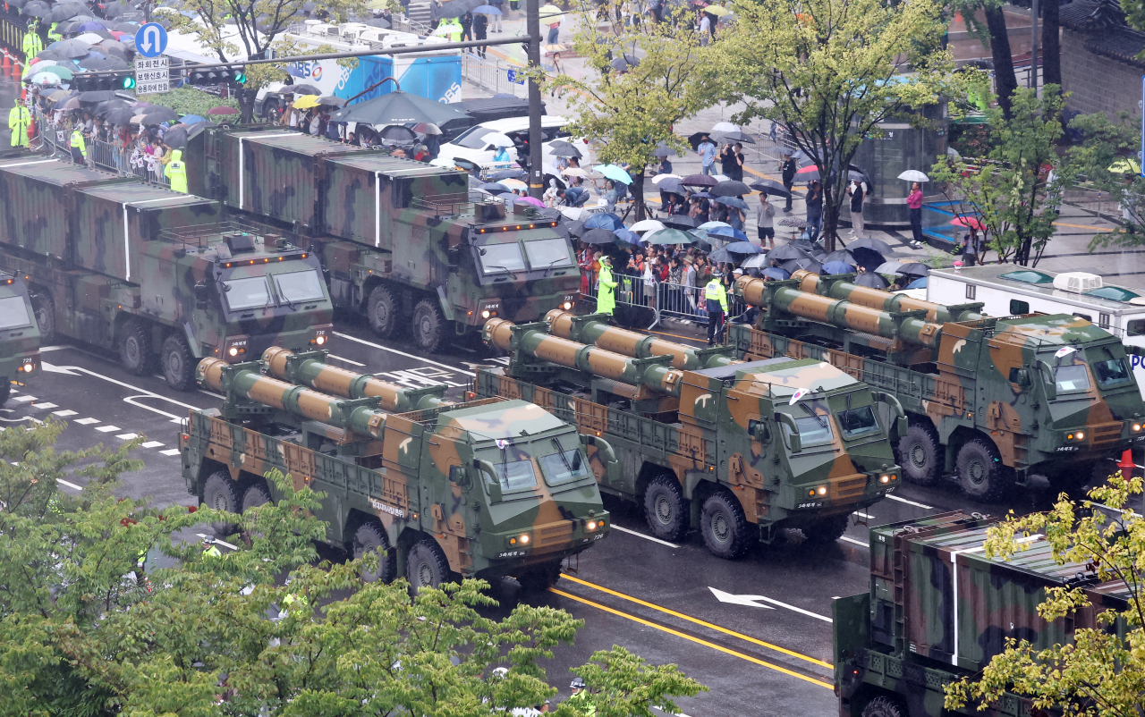 Amidst the rain, South Korea showcases its indigenous Hyunmoo ballistic missiles during a military street parade in downtown Seoul, commemorating the 75th anniversary of Armed Forces Day. (Yonhap)