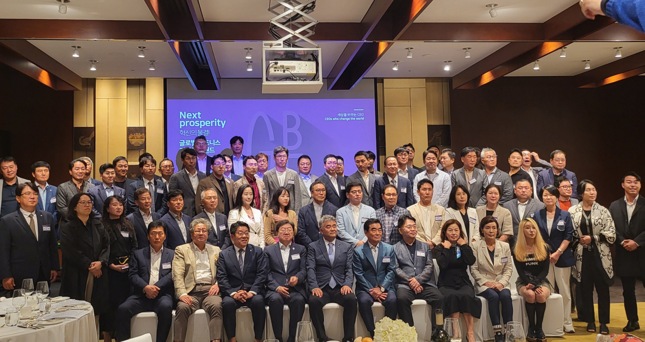 Attendees pose for a group photo at the fourth edition of the Global Business Forum hosted by The Korea Herald at the Grand Hyatt Seoul in Yongsan-gu, Seoul, Wednesday. (The Korea Herald)