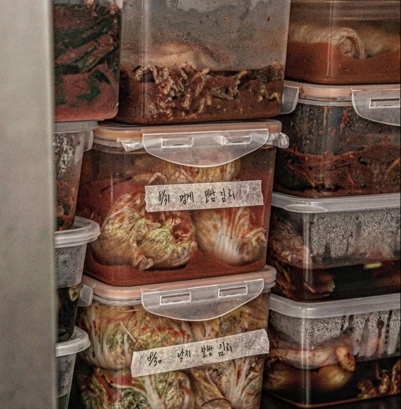Containers of different types of kimchi at On 6.5 (On 6.5)