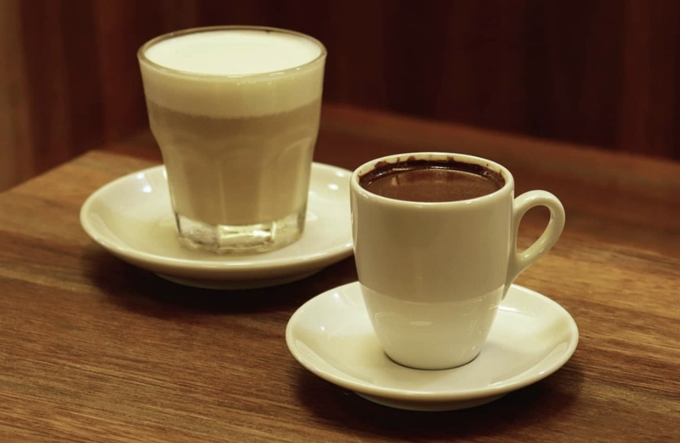 Nontanto Coffee's signature golden cream latte (left) and Cezve original black. (Sand Coffee Nontanto)