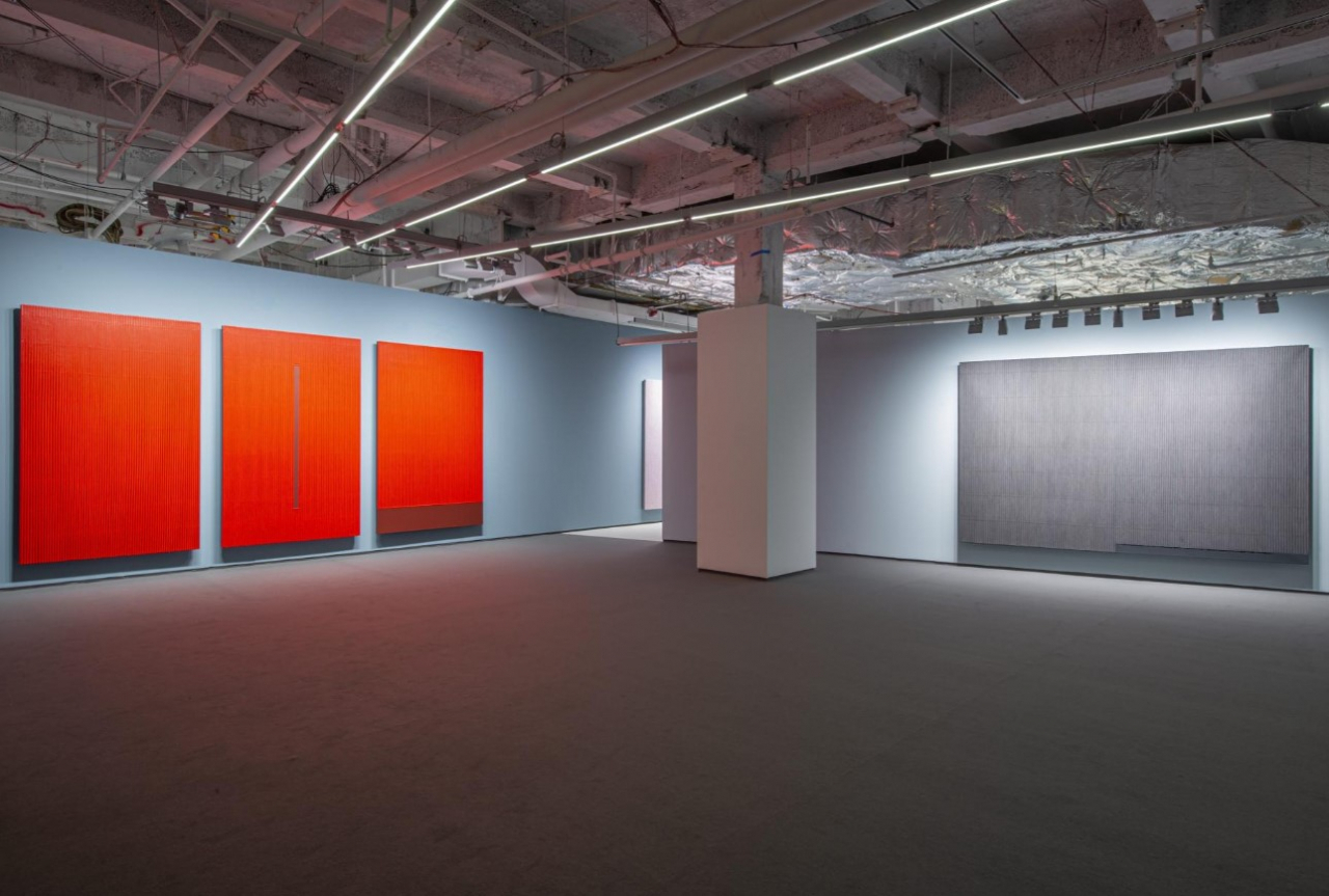An installation view shows the 