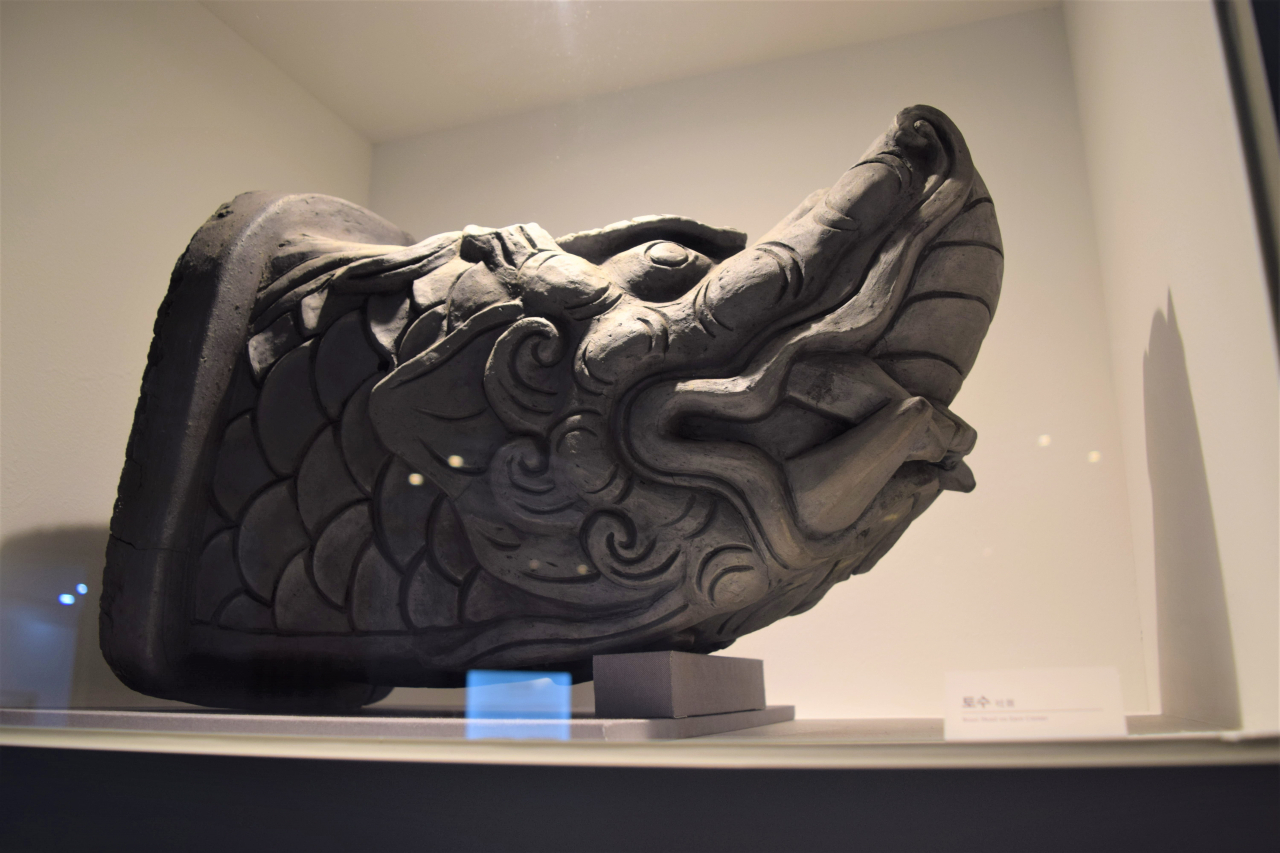 Roof tile figure of a beast's head from a hanok eave (Kim Hae-yeon/The Korea Herald)