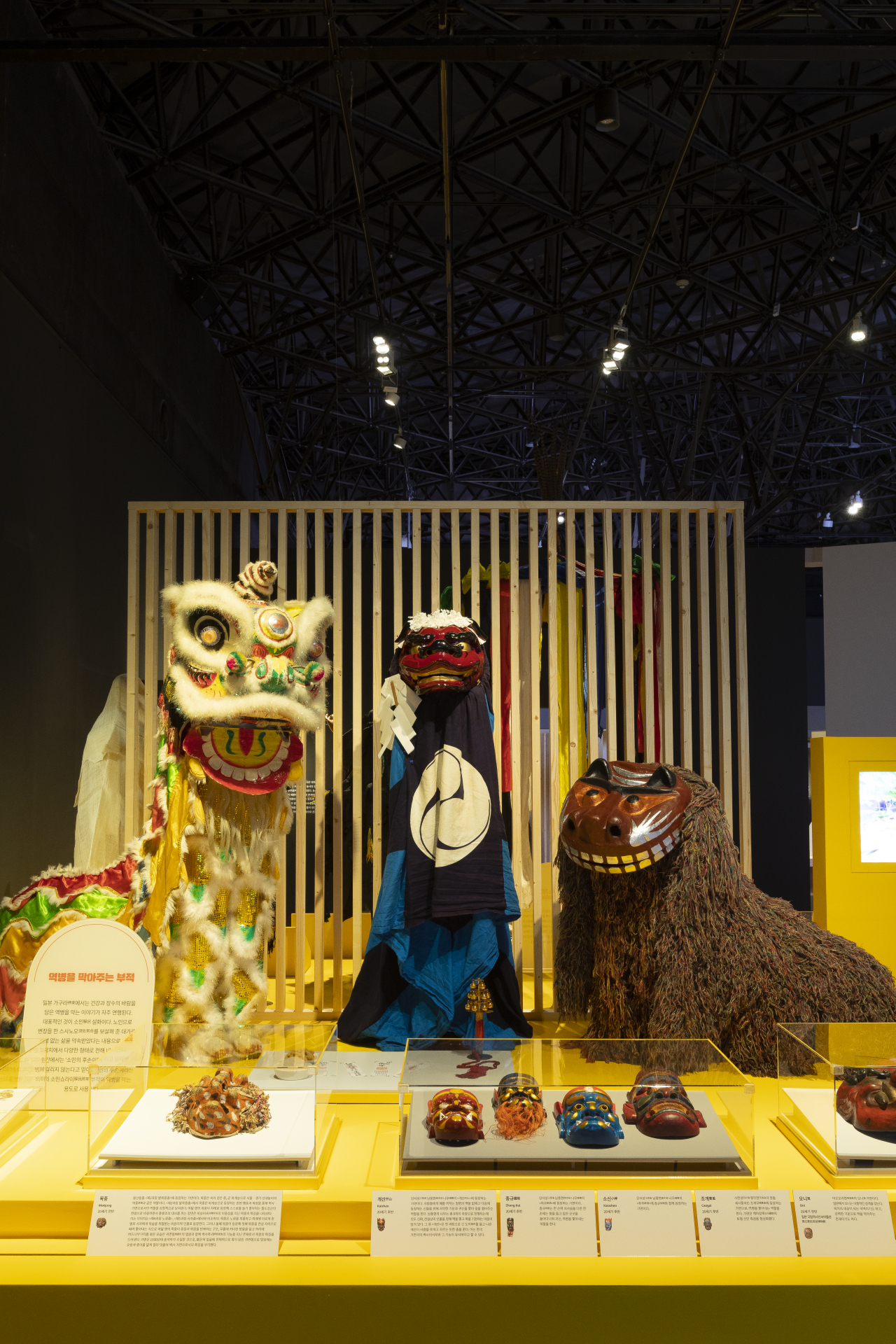 From right: Lion masks of Korea, Japan and China are on display at 