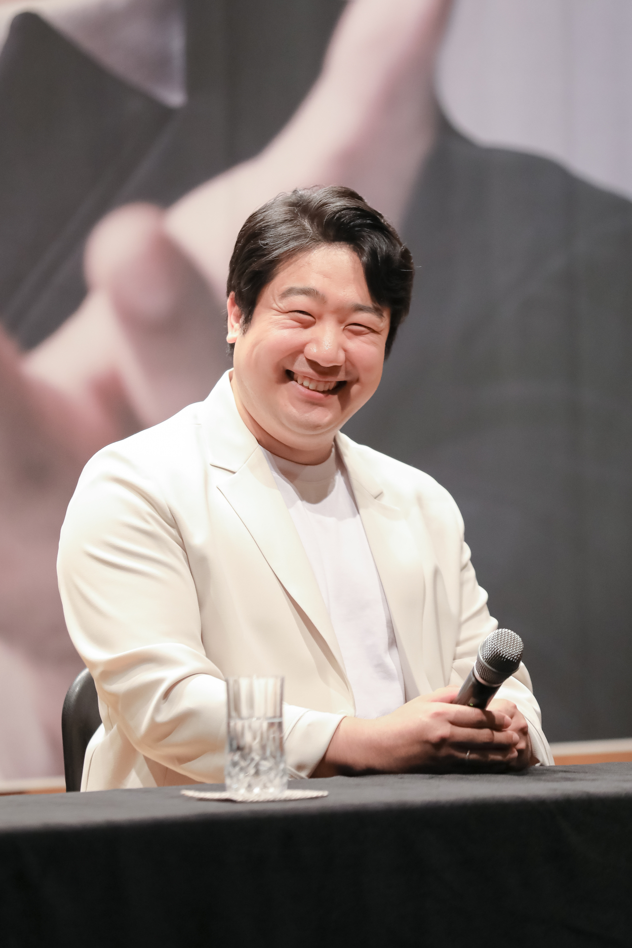 South Korean baritone Kim Gi-hoon smiles during an interview in Seoul on Tuesday. (Arts and Artists)
