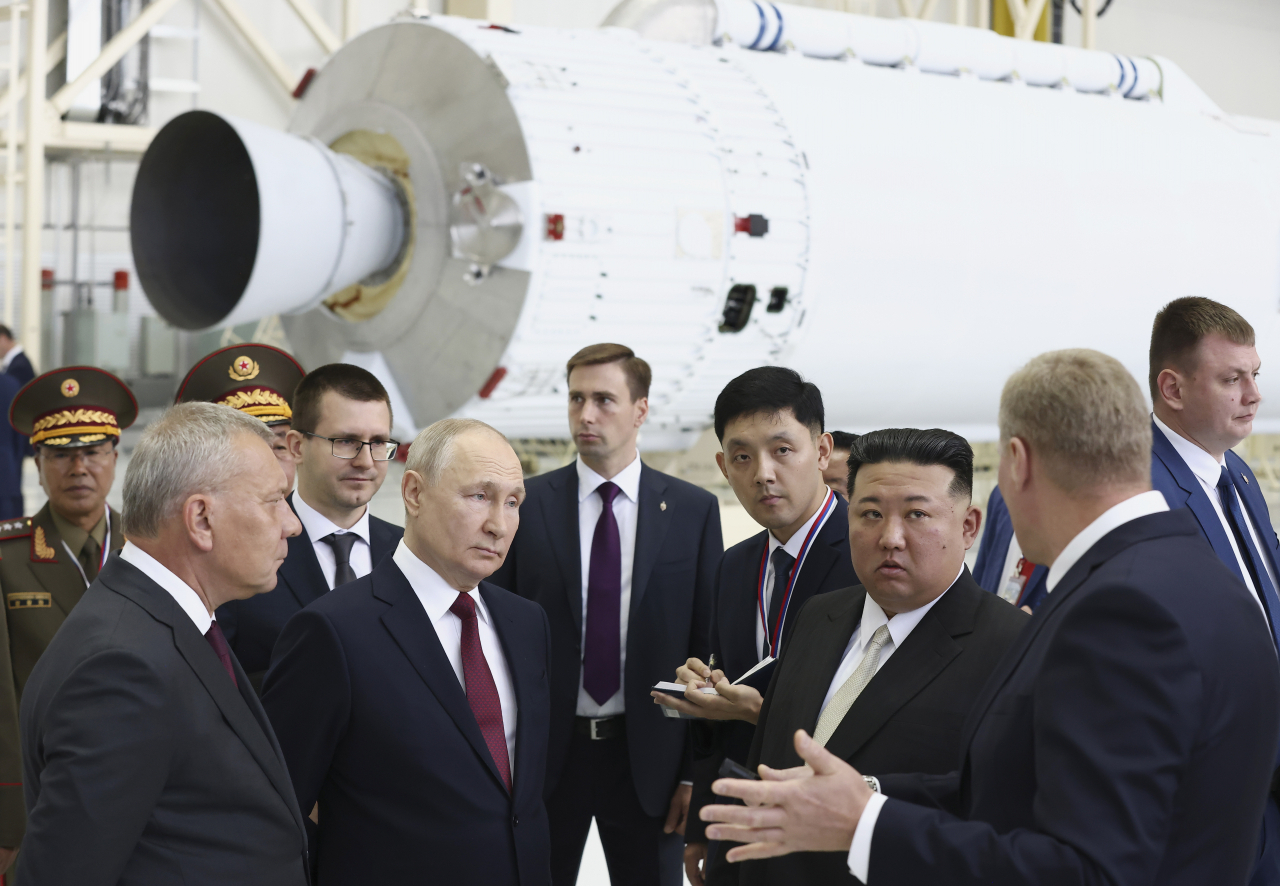 Russian President Vladimir Putin (second left in front) and North Korea's leader Kim Jong-un (second right in front) examine a rocket assembly hangar during their meeting at the Vostochny Cosmodrome outside the city of Tsiolkovsky, about 200 kilometers from the city of Blagoveshchensk in the far eastern Amur region, Russia on Sept. 13, 2023. (File Photo - AP)