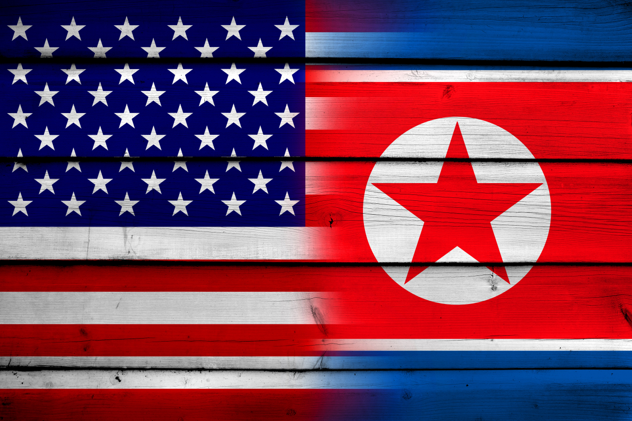 The US (left) and North Korean flags. (123rf)