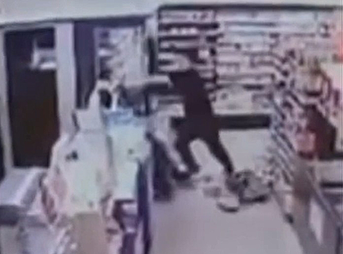 This security camera footage shows a man in his 20s assaulting a convenience store clerk in Jinju, South Gyeongsang Province, Saturday. (Yonhap)