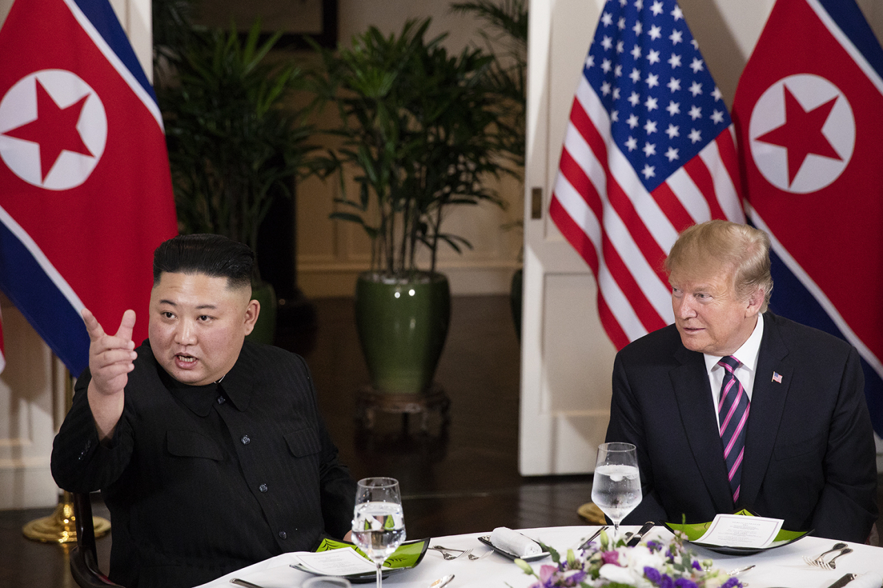 Then-US President Donald Trump (right) and North Korean leader Kim Jong-un met for a social dinner on Feb. 27, 2019, at the Sofitel Legend Metropole hotel in Hanoi, for their second summit meeting. (File Photo - White House)