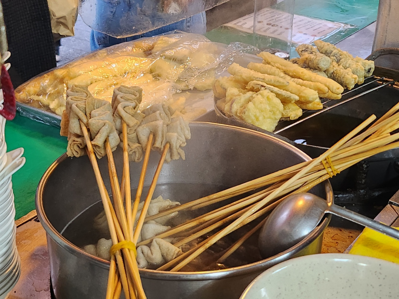 Eomuk sticks are displayed with other snacks at a street snack vendor in Samcheong-dong, northern Seoul, Sunday. (Lee Jung-youn/The Korea Herald)