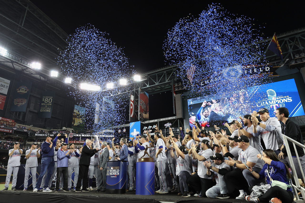 The Texas Rangers celebrate after beating the Arizona Diamondbacks 5-0 in Game 5 to win the World Series at Chase Field on Nov. 1 in Phoenix, Arizona. (Getty Images)