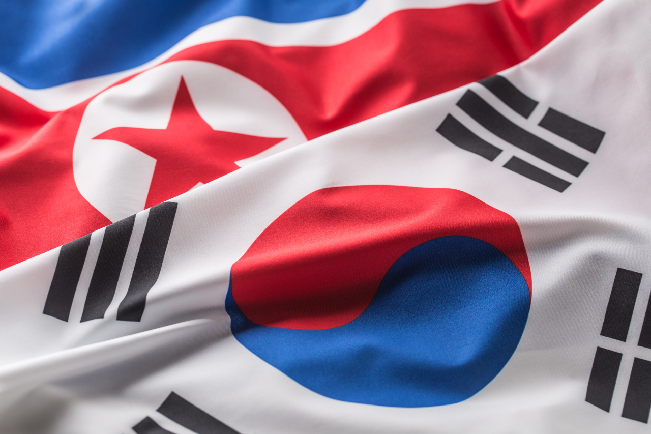 North and South Korean flags (123rf)