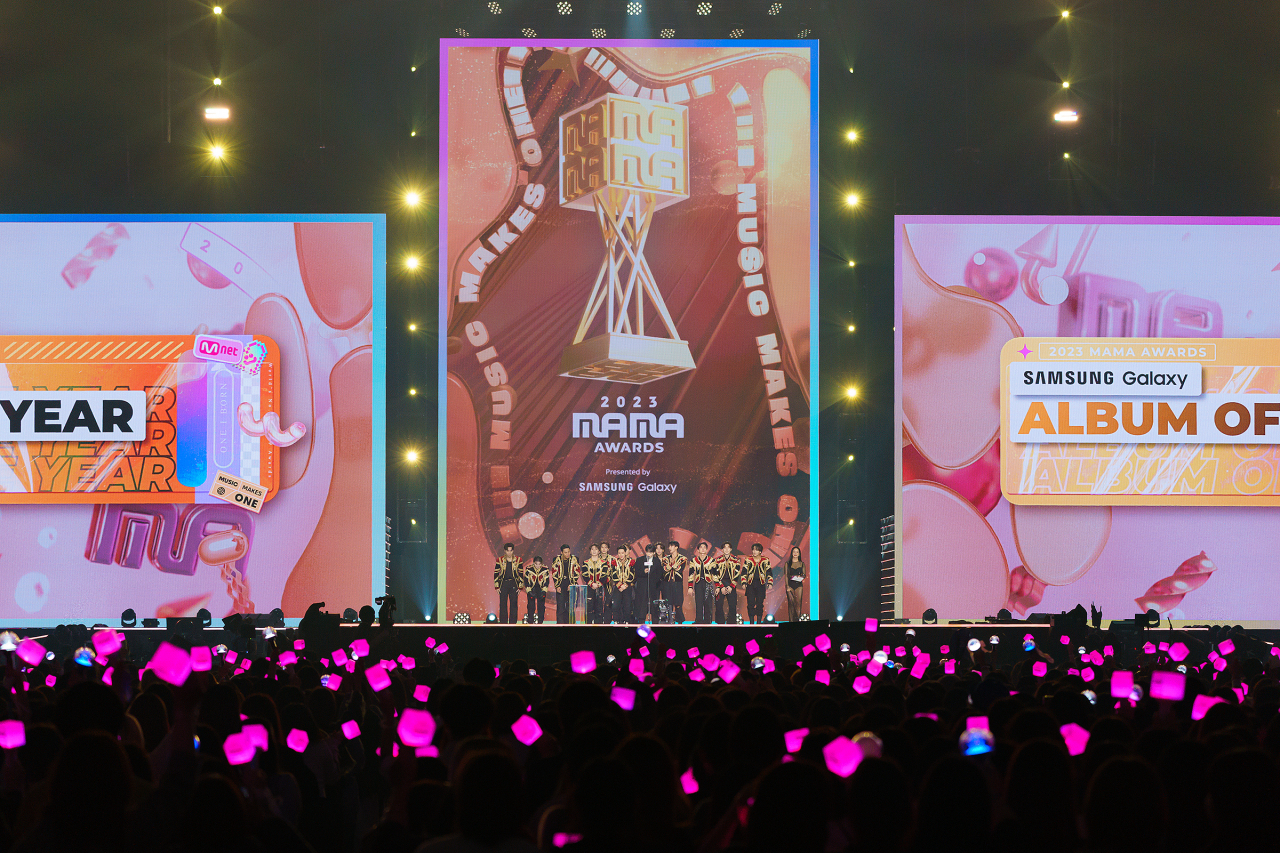 Seventeen stands on the stage to receive an award on the last night of the 2023 MAMA Awards at Tokyo Dome in Tokyo, Wednesday. (Mnet)