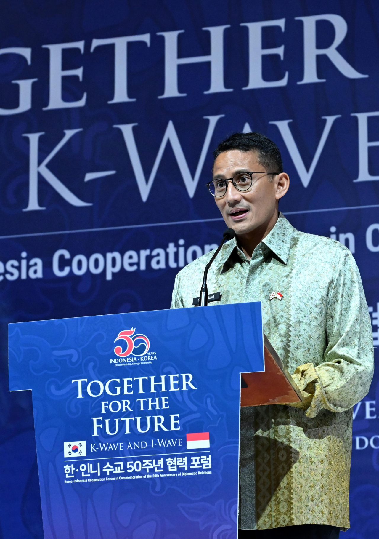 Indonesia's Minister of Tourism and Creative Economy Sandiaga Uno gives a keynote speech during the 