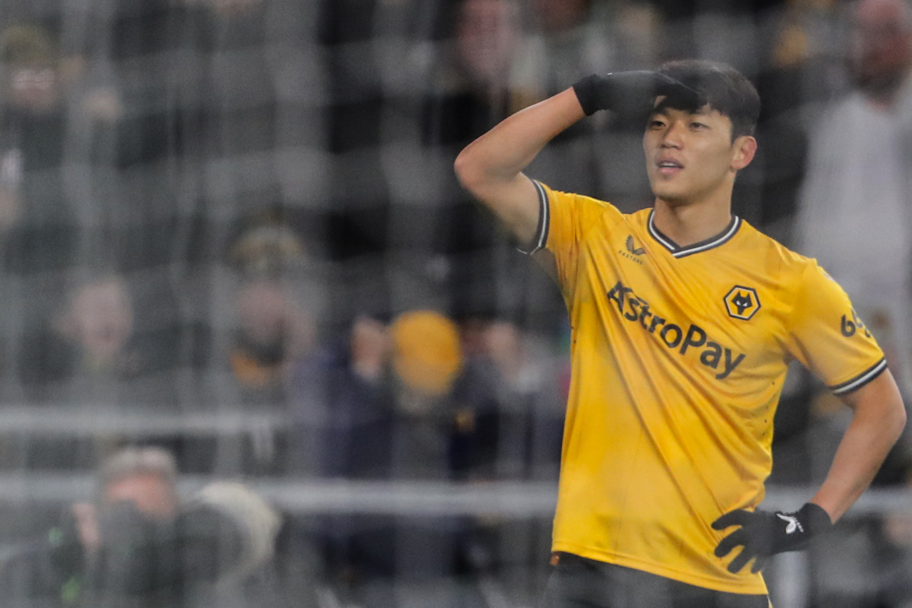 Hwang Hee-chan of Wolverhampton Wanderers celebrates after scoring against Burnley during the clubs' Premier League match at Molineux Stadium in Wolverhampton, England, Tuesday. (Yonhap)
