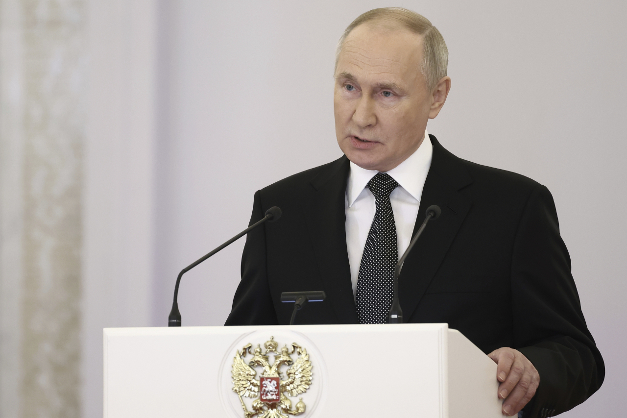 Russian President Vladimir Putin delivers a speech during a ceremony to present Gold Star medals to Heroes of Russia on the eve of Heroes of the Fatherland Day at the St. George Hall of the Grand Kremlin Palace in Moscow, Russia, Friday, Dec. 8, 2023. (Valery Sharifulin, Sputnik, Kremlin Pool Photo via AP) POOL PHOTO