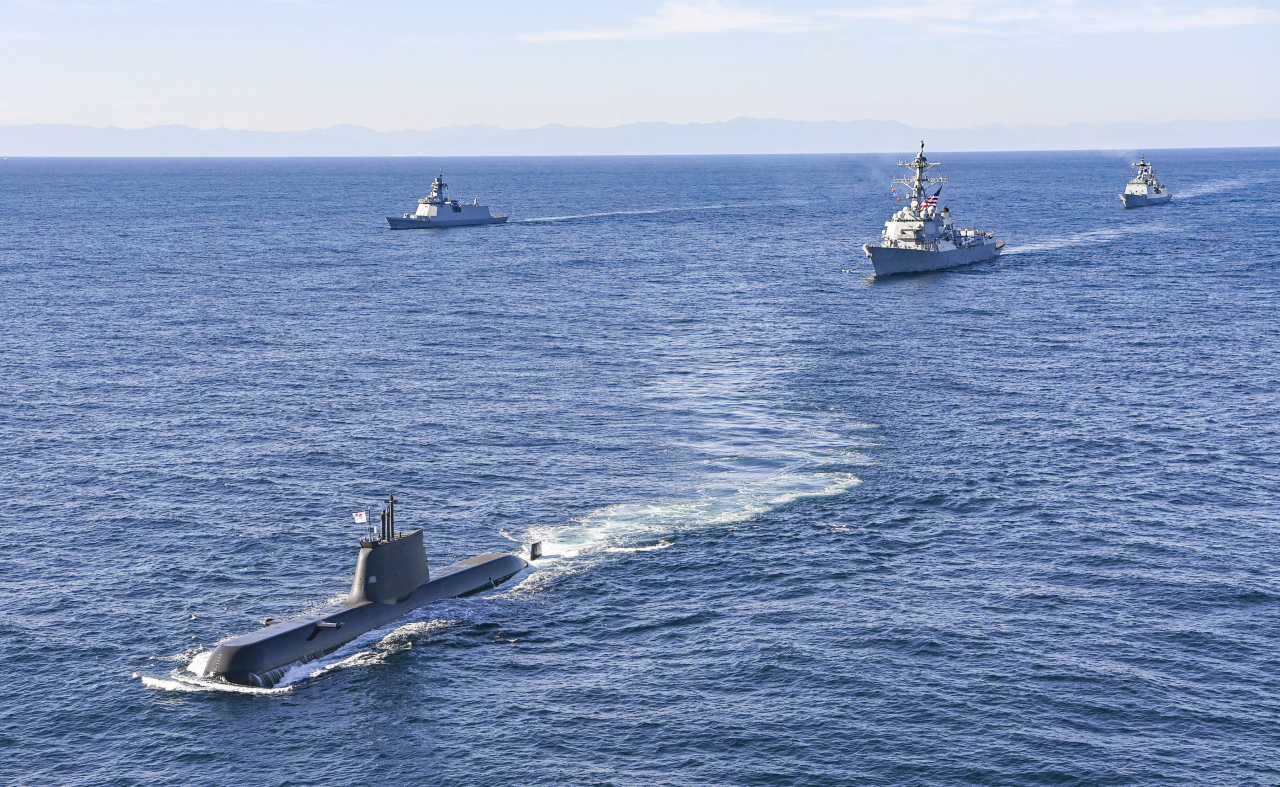 Navies of South Korea and the United States stage combined anti-submarine and counter special operations drills in the East Sea on Nov. 14. (South Korean Navy)