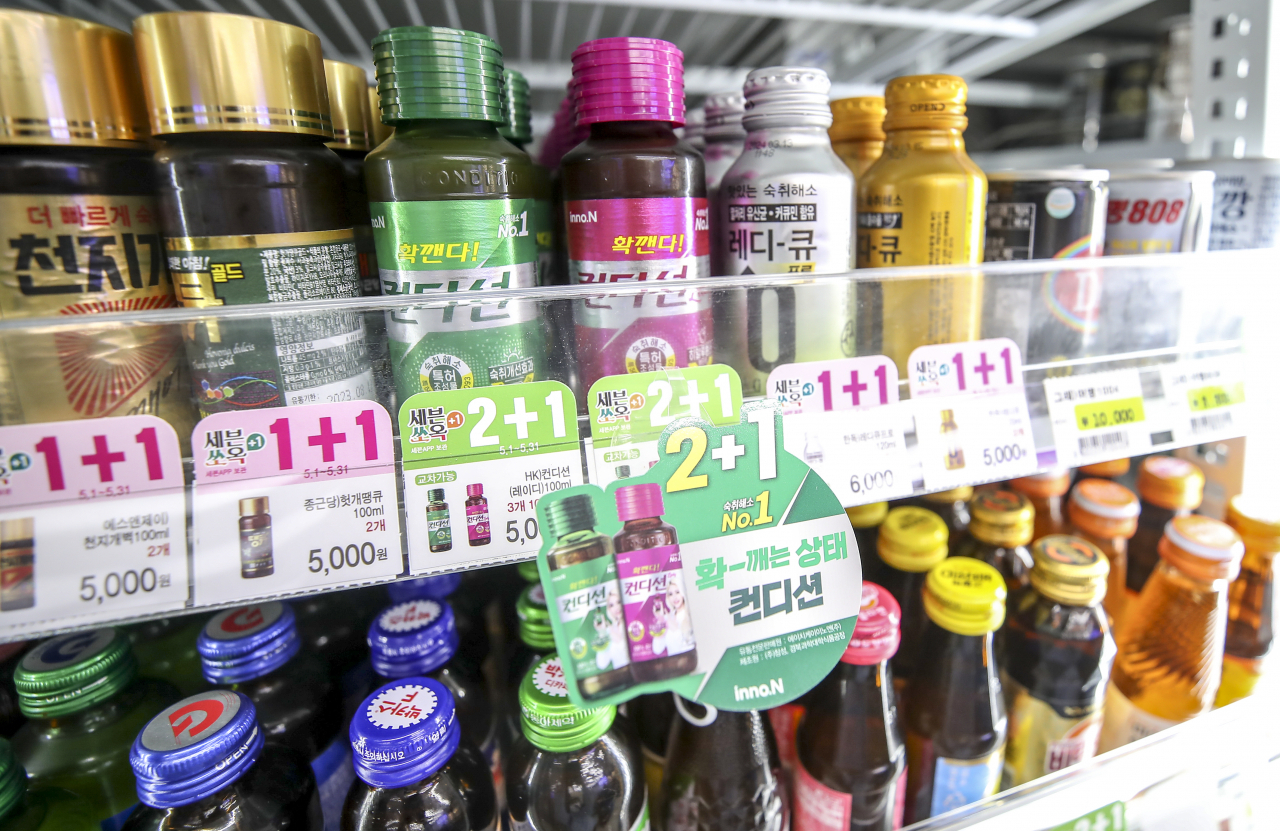 Various types of hangover drinks are stocked at a convenience store in Seoul, on May 17, 2022. (Newsis)