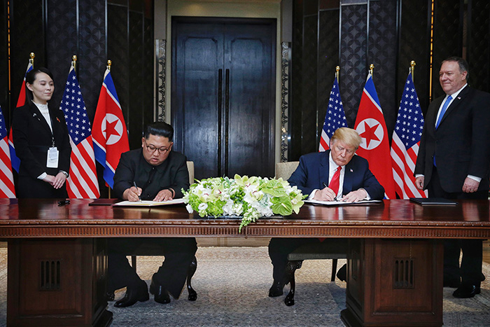 Former US President Donald J. Trump and Chairman Kim Jong Un of the State Affairs Commission of the Democratic People's Republic of Korea (DPRK) holds a first, historic summit in Singapore on June 12, 2018. (Ministry of the Interior and Safety Presidential Archives)
