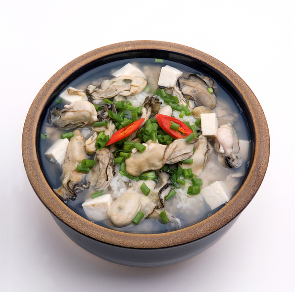 Gulgukbap is a rice soup with oysters. It is made by boiling the soup over a long time with oysters, tofu and other vegetables. (Getty Images)