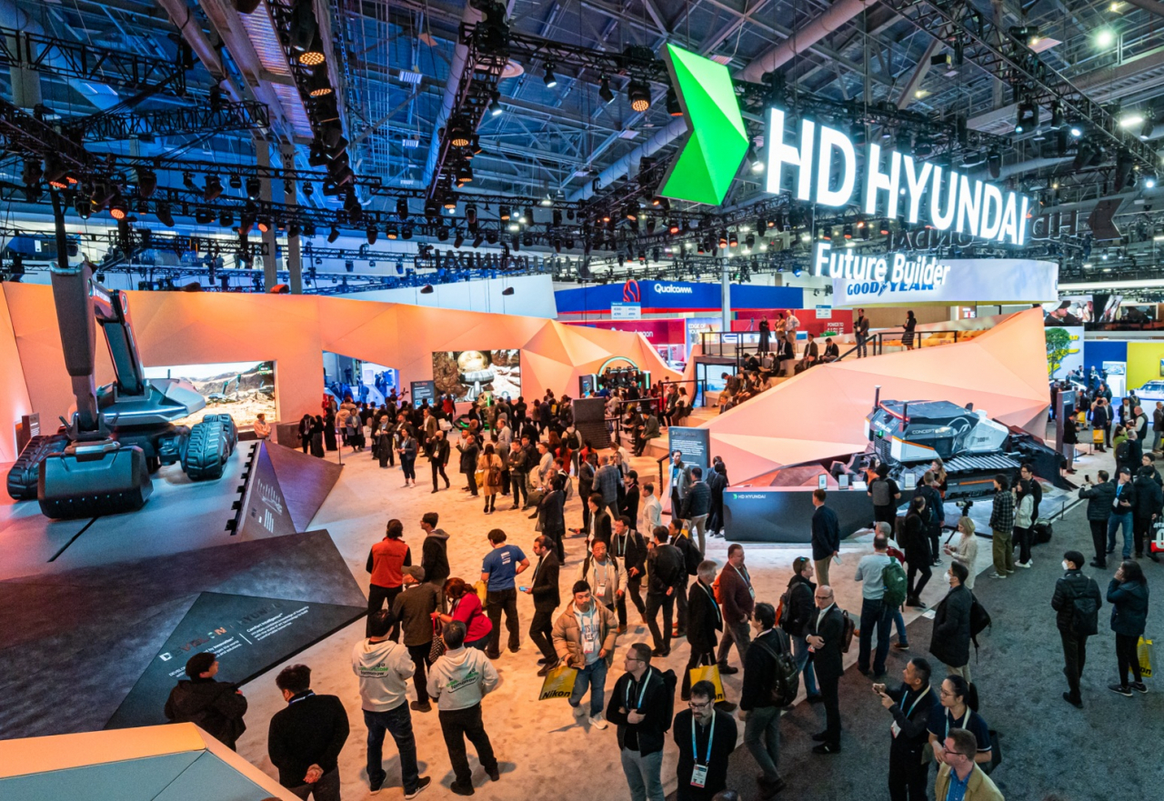 Visitors browse through HD Hyundai's exhibition at CES 2024 in Las Vegas on Tuesday. (HD Hyundai)