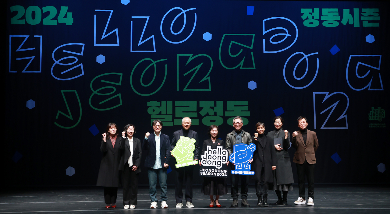 Directors of the creative teams for Jeongdong Theater's 2024 season and Jeongdong Theater CEO Choung Soung-sook (center) pose for a group photo after a press conference at the National Jeongdong Theater of Korea, Wednesday. (Yonhap)