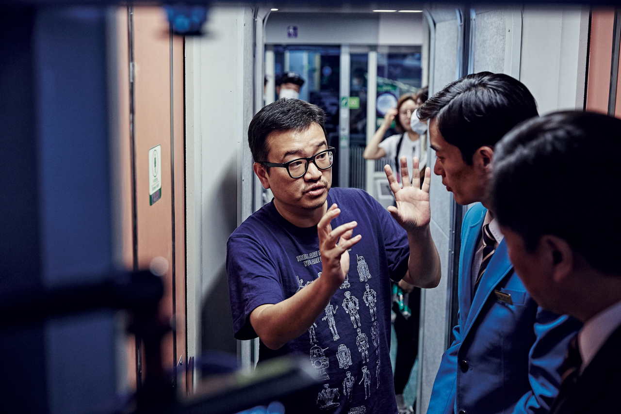 Director Yeon Sang-ho is seen on the set of 