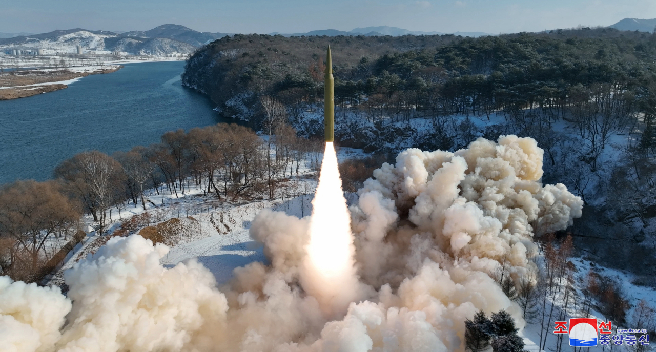 This photo, carried by North Korea's official Korean Central News Agency on Monday, shows North Korea's launch of a solid-fuel intermediate-range ballistic missile (IRBM) carrying a hypersonic warhead the previous day. (Yonhap)