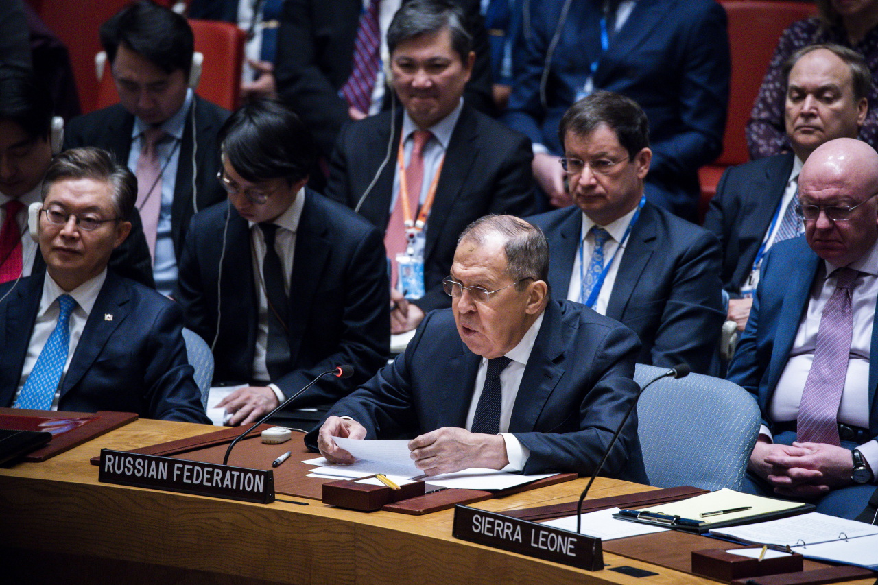 Russian Foreign Minister Sergei Lavrov (right), speaks to delegates during a security council meeting at United Nations Headquarters on Monday, while South Korean Ambassador to the UN Hwang Joon-kook (left) listens to his remarks. (AP)