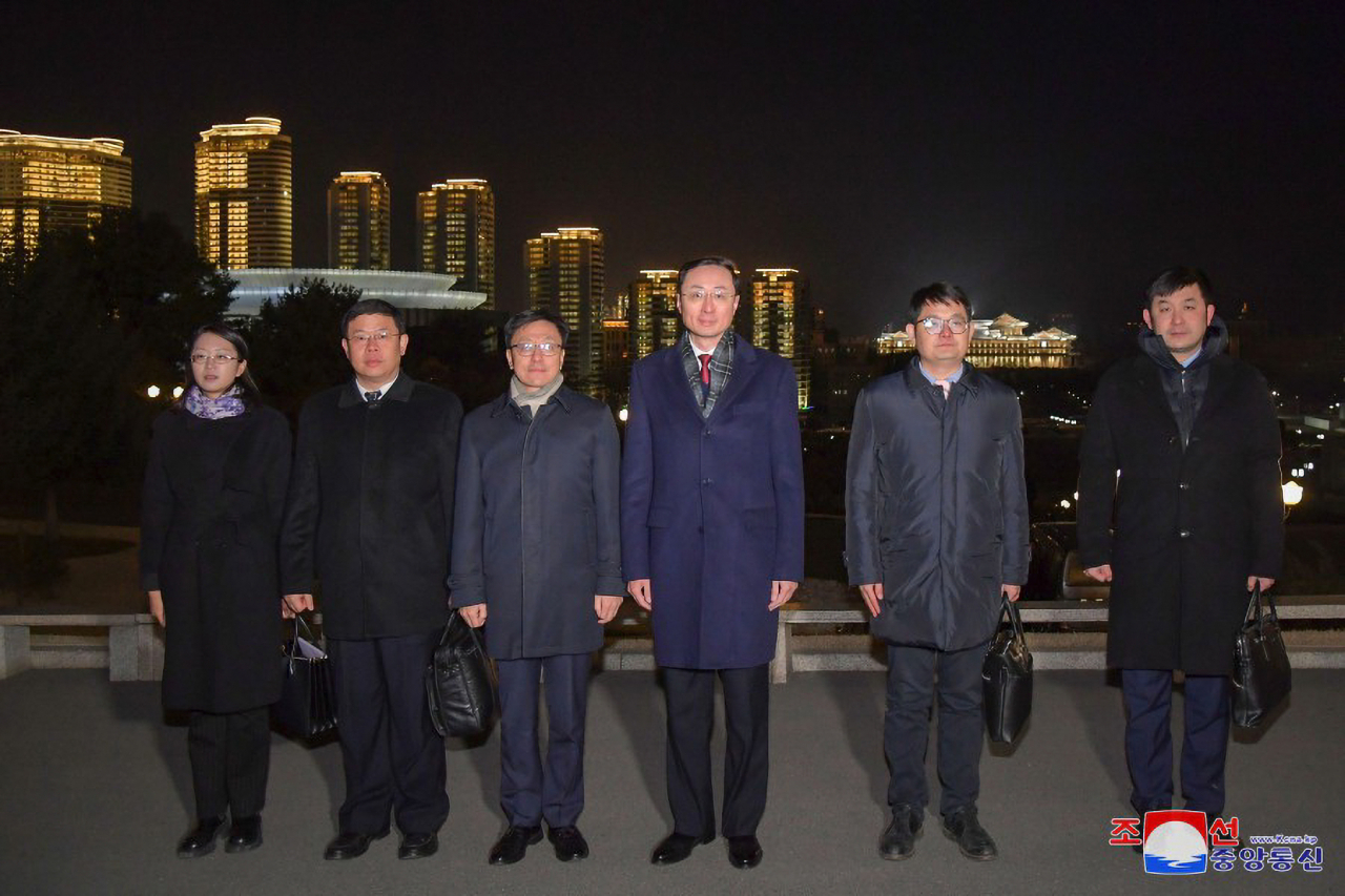This photo, carried by North Korea's Korean Central News Agency on Friday, shows Chinese Vice Foreign Minister Sun Weidong (third from right) and his delegation of Chinese diplomats as they visit Pyongyang.