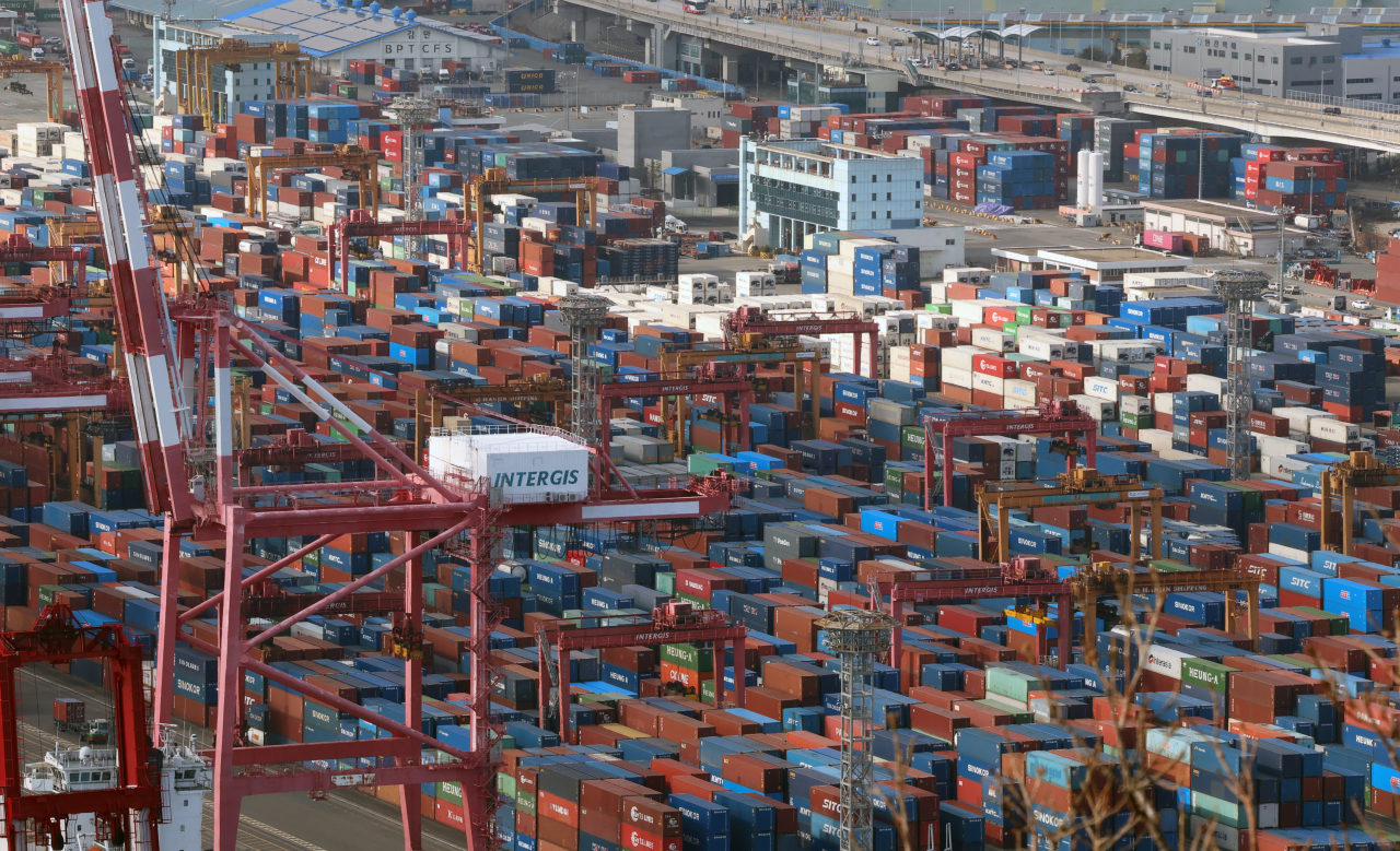 This file photo taken Jan. 1, 2024, shows a pier in the southeastern port city of Busan packed with containers set to be transported. (Yonhap)