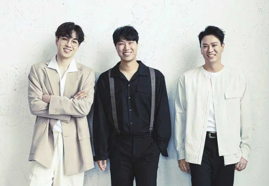 From left: SG Wannabe members Lee Seok-hoon, Kim Jin-ho, and Kim Yong-jun. (C9 Entertainment)