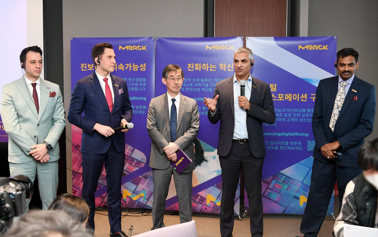 From left: Safa Kutup Kurt, head of operations and digital solutions at Merck; Benjamin Hein, head of the specialty gases business unit at Merck; Kim Woo-kyu, managing director of Merck Korea; Anand Nambiar, head of formulated materials business unit at Merck; and Suresh Rajaraman, head of thin films business unit at Merck speak with local media reports in a press briefing in Seoul on Friday. (Merck Korea)