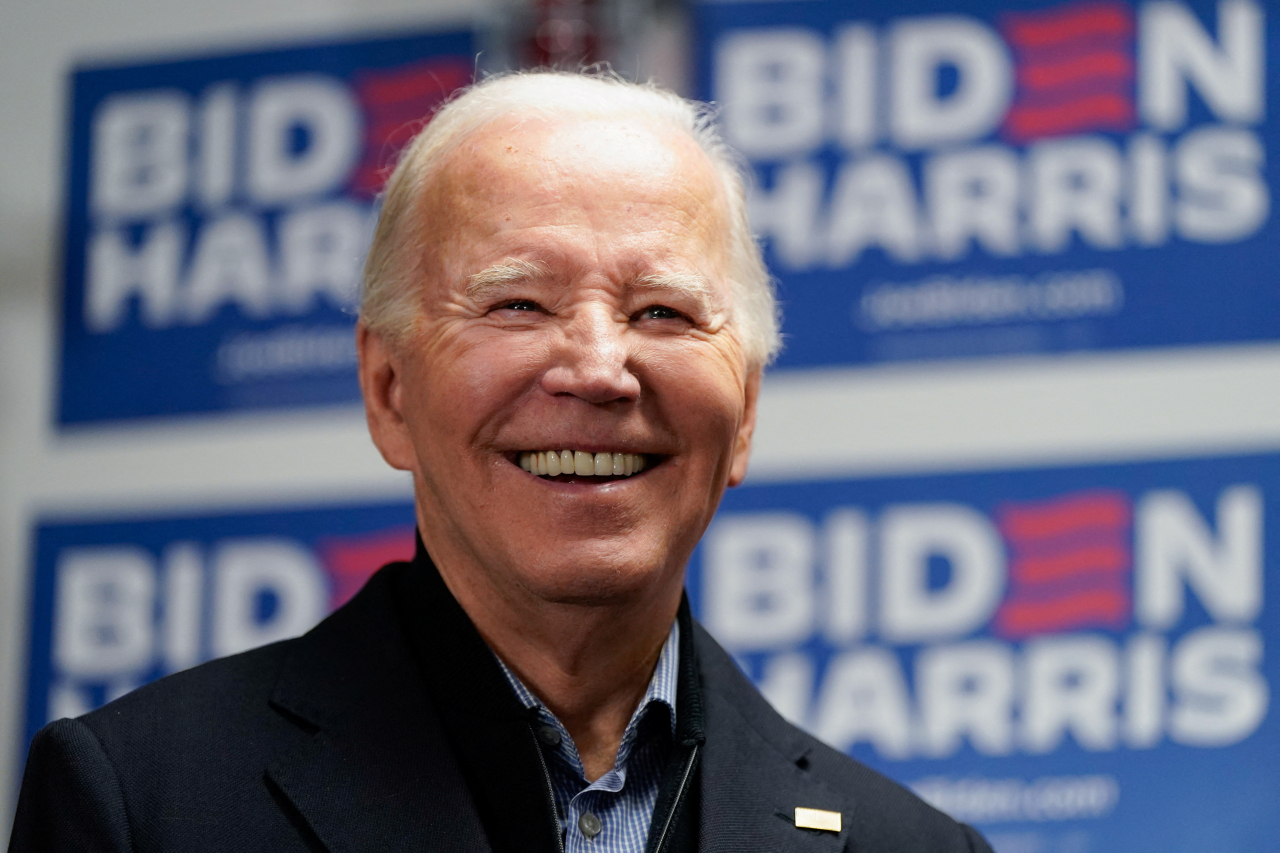 US President Joe Biden reacts as he attends the opening of the Biden for President campaign office in Wilmington, Delaware, US, Saturday. (Reuters-Yonhap)