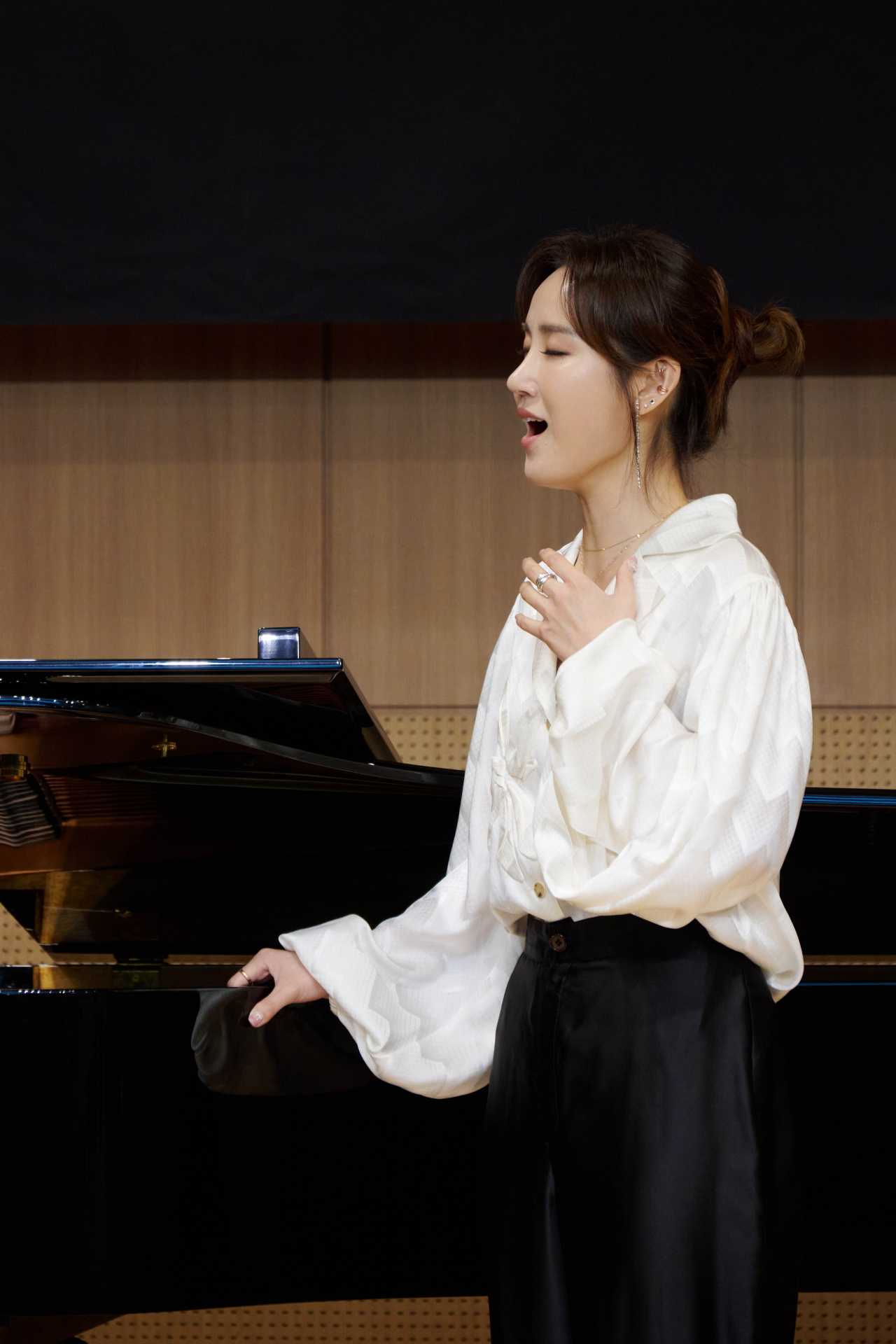 Soprano Park Hye-sang sings during a press conference held at Cosmos Art Hall in Seoul on Monday. (Universal Music)